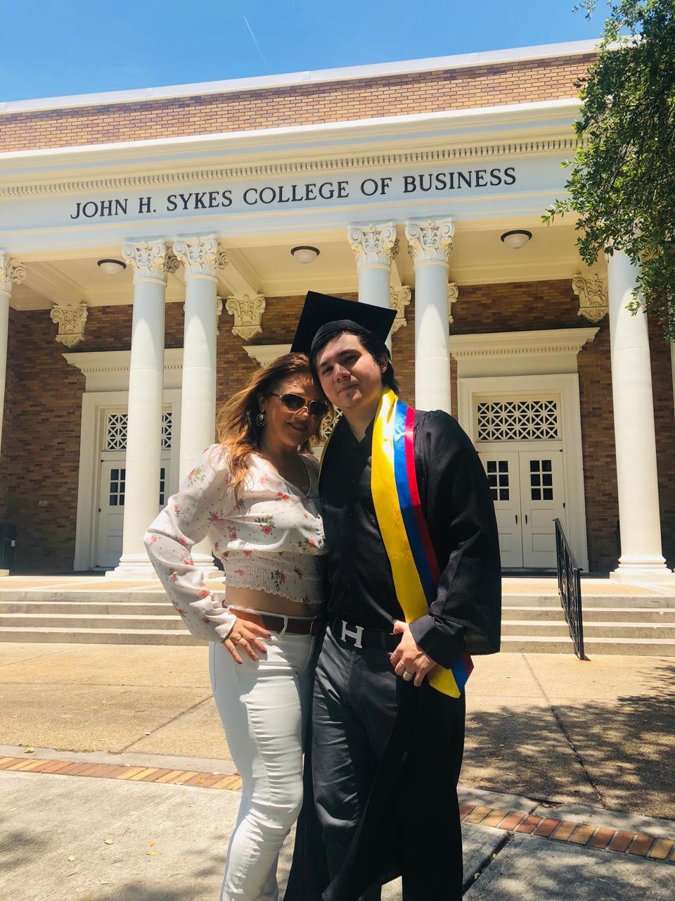 Sebastian with his family at his graduation from the University of Tampa, 2019